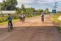 School boys on bicycles in Muang Khong, Laos.